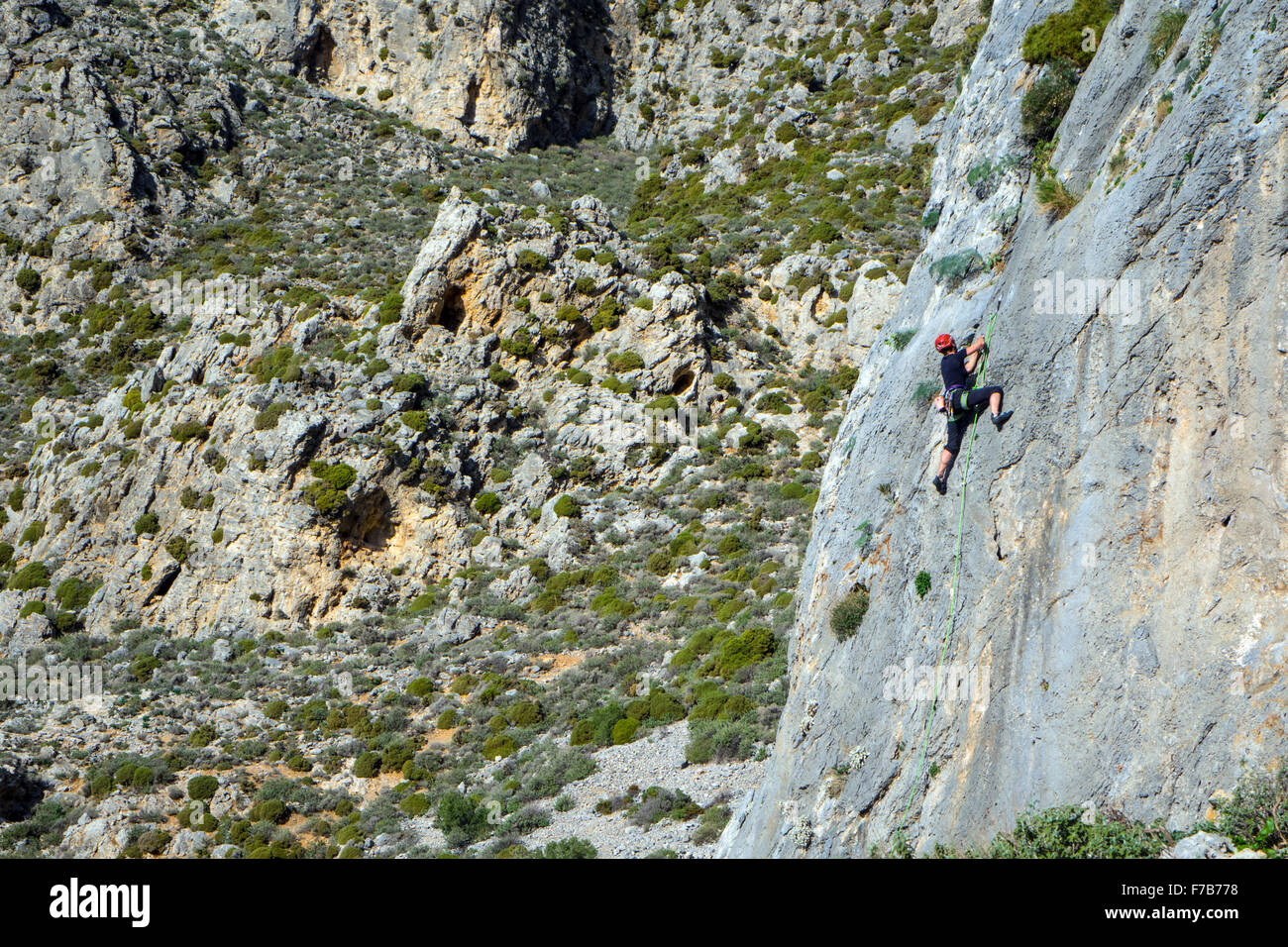 Rock climber on sunny cliff, sport climbing, Greece Stock Photo Alamy