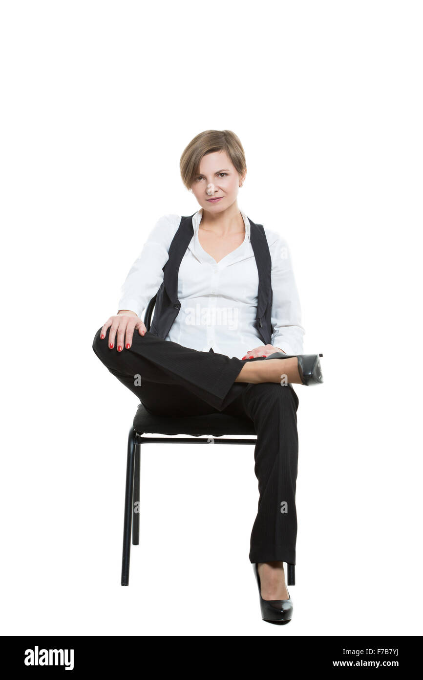 Pretty woman sitting legs crossed hi-res stock photography and images ...
