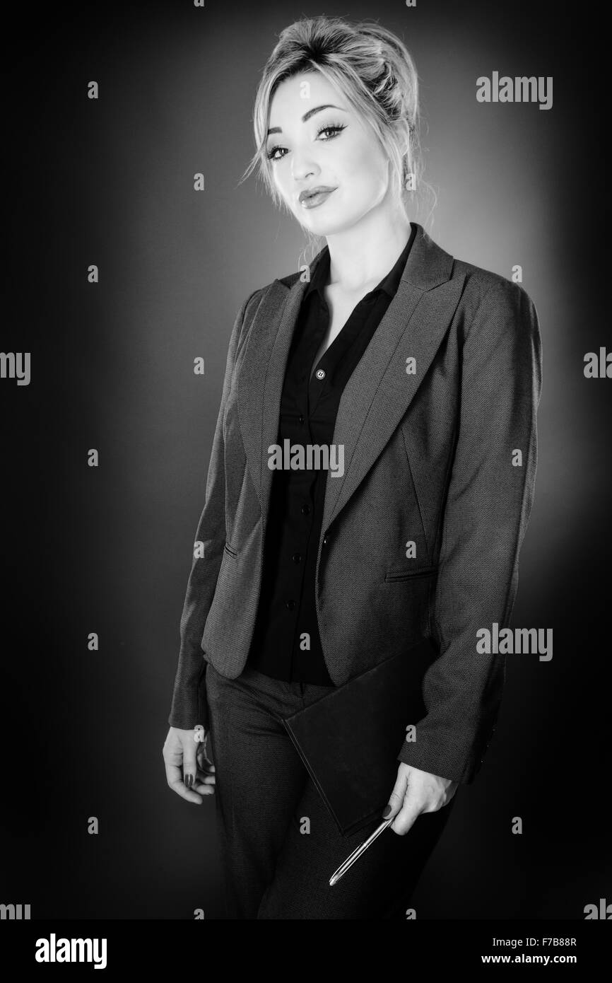 young business woman shot in the studio on a grey background Stock ...