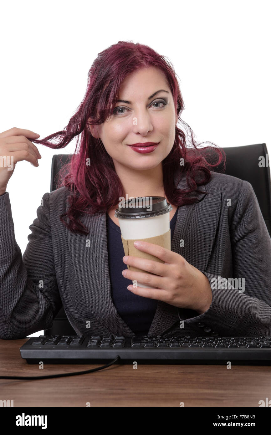 happy secretary sitting at desk drink from a take away paper cup Stock ...