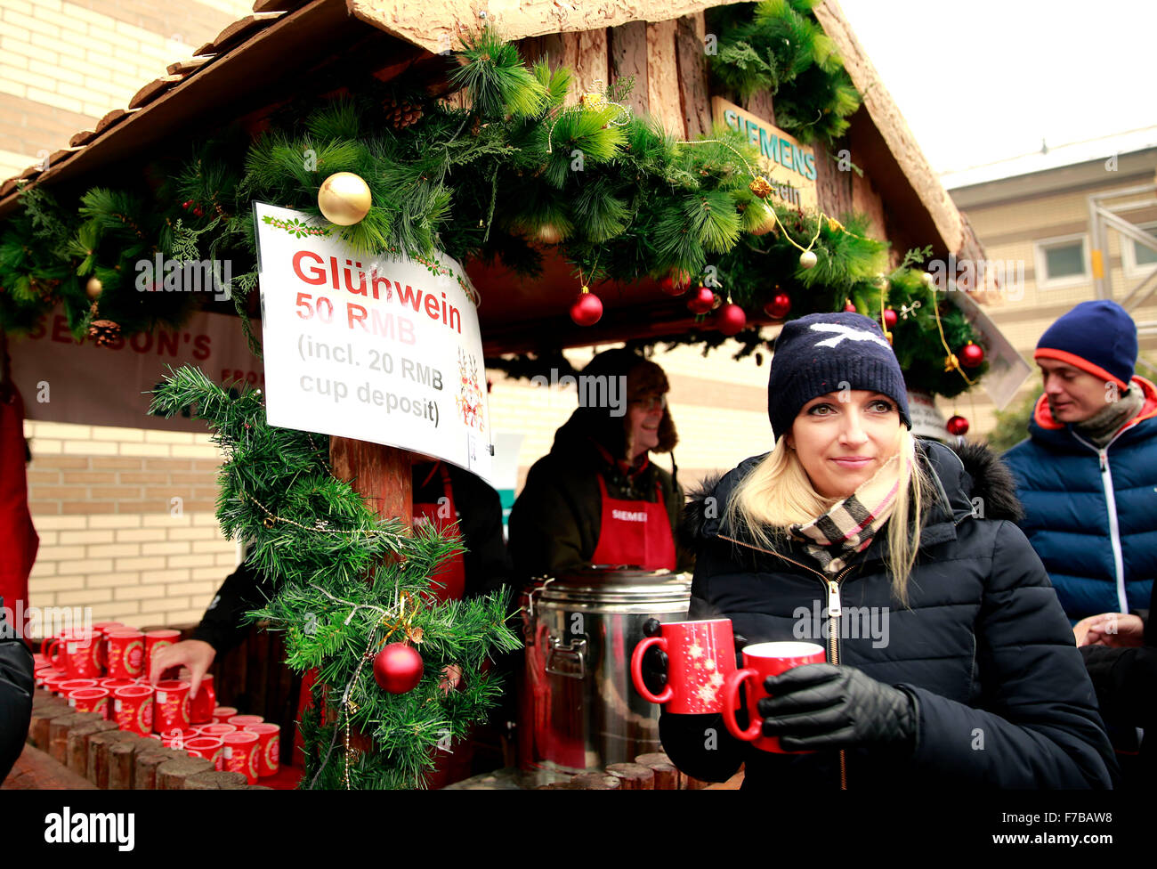 Beijing, China. 28th Nov, 2015. Customers visit the Christmas market ...