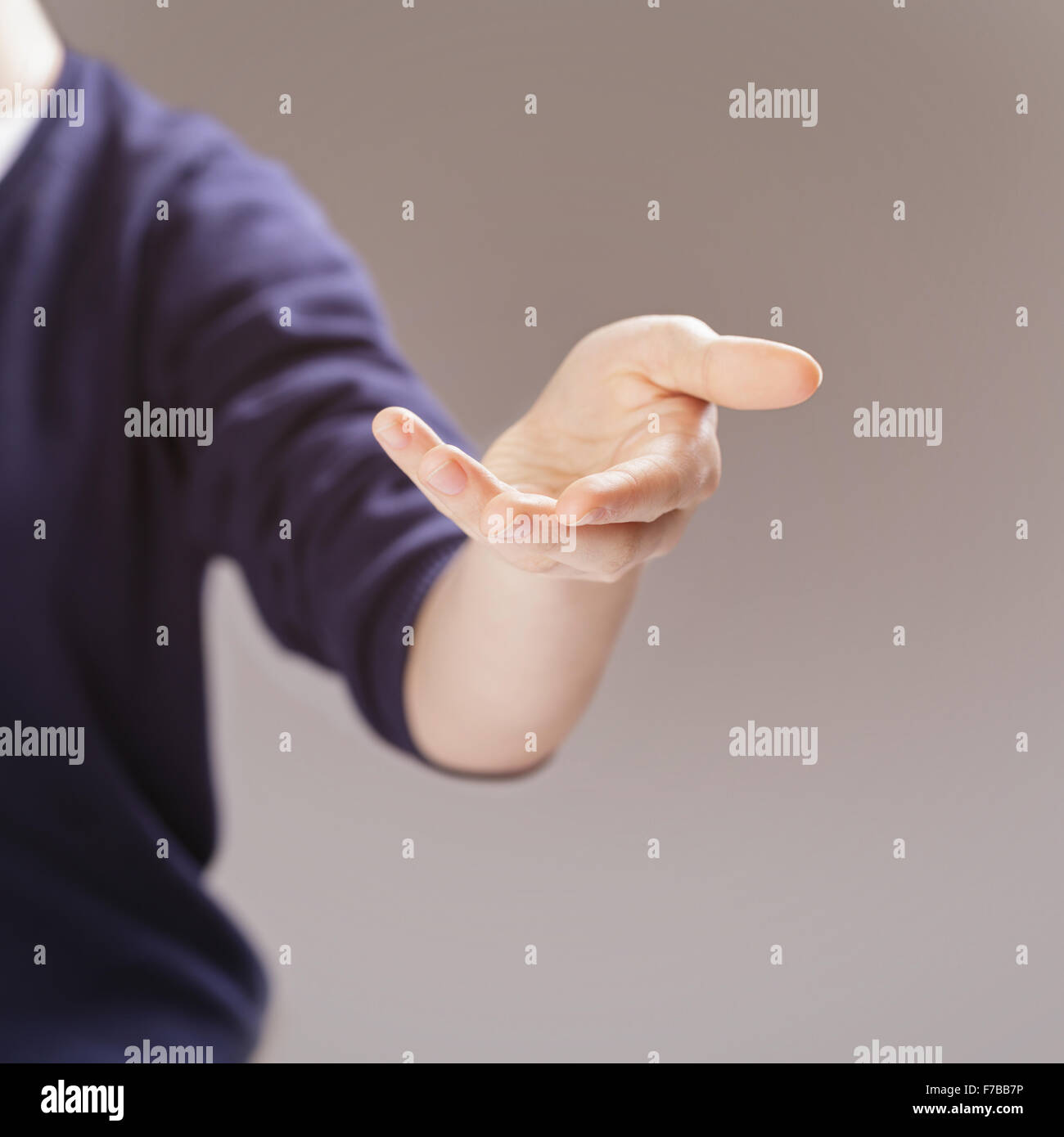 female teen hand to presenting or showing something selective focus Stock Photo