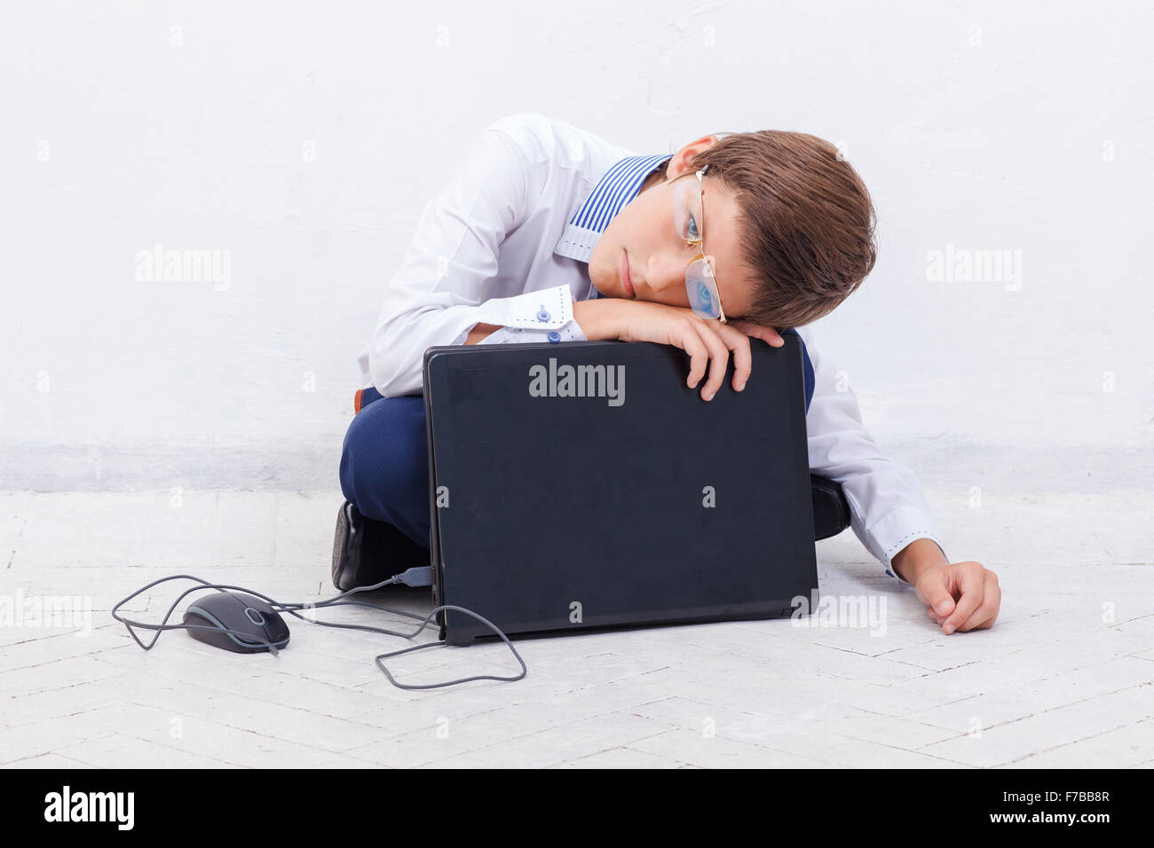 Boy using his laptop computer Stock Photo - Alamy