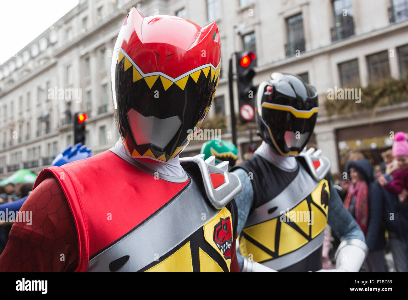 London, UK. 28 November 2015. Power Rangers on parade. The inaugural Hamleys Christmas Toy Parade takes place along Regent Street, which went traffic-free for the day. The parade organised by the world-famous toy store Hamleys featured over 50 of the nation's favourite children's characters along with 400 entertainers, a marching band and giant balloons. The parade is modelled on Macy's annual Thanksgiving Parade in New York. Credit:  Vibrant Pictures/Alamy Live News Stock Photo