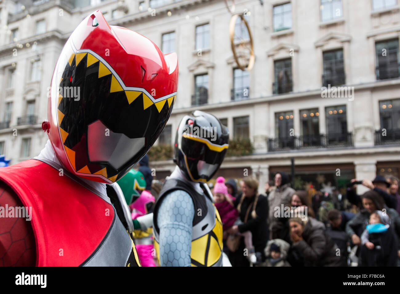 London, UK. 28 November 2015. Power Rangers on parade. The inaugural Hamleys Christmas Toy Parade takes place along Regent Street, which went traffic-free for the day. The parade organised by the world-famous toy store Hamleys featured over 50 of the nation's favourite children's characters along with 400 entertainers, a marching band and giant balloons. The parade is modelled on Macy's annual Thanksgiving Parade in New York. Credit:  Vibrant Pictures/Alamy Live News Stock Photo