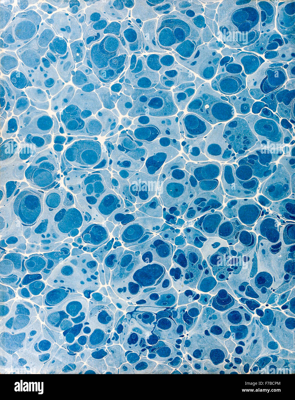 Hand marbled pastedown or endpaper from 19th century book binding. See