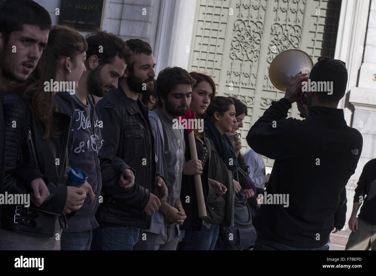 Athens, Greece. 28th Nov, 2015. Leftists hold banners and shout slogans ...