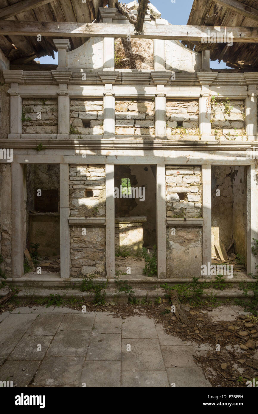 An old abandoned Church is standing in ruin at Old Perithia, Palaia Peritheia, Corfu, Greece. Stock Photo