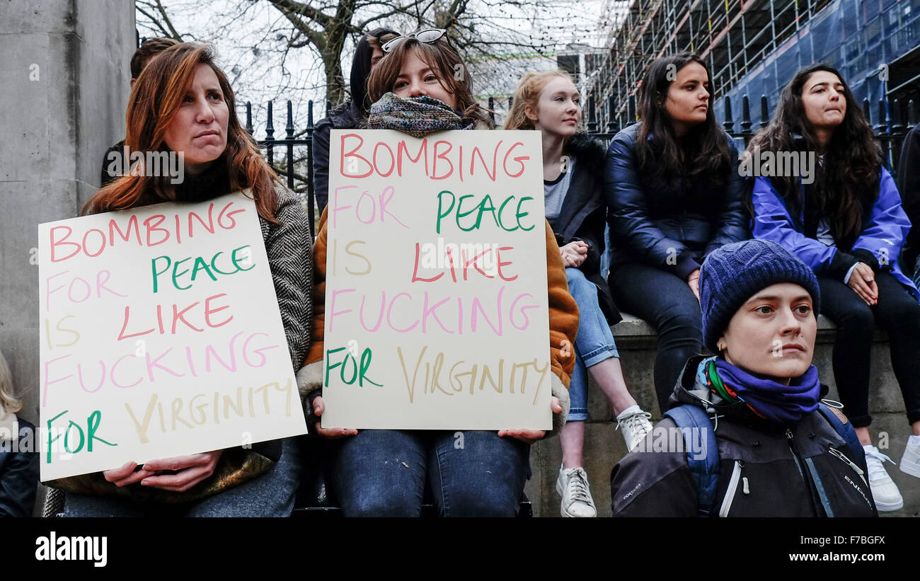 London, UK, 28th November, 2015.  Protesters hold up placards in protest against the UK government proposal to commence bombing Syria.  Credit: Gordon Scvammell/Alamy Live News Stock Photo