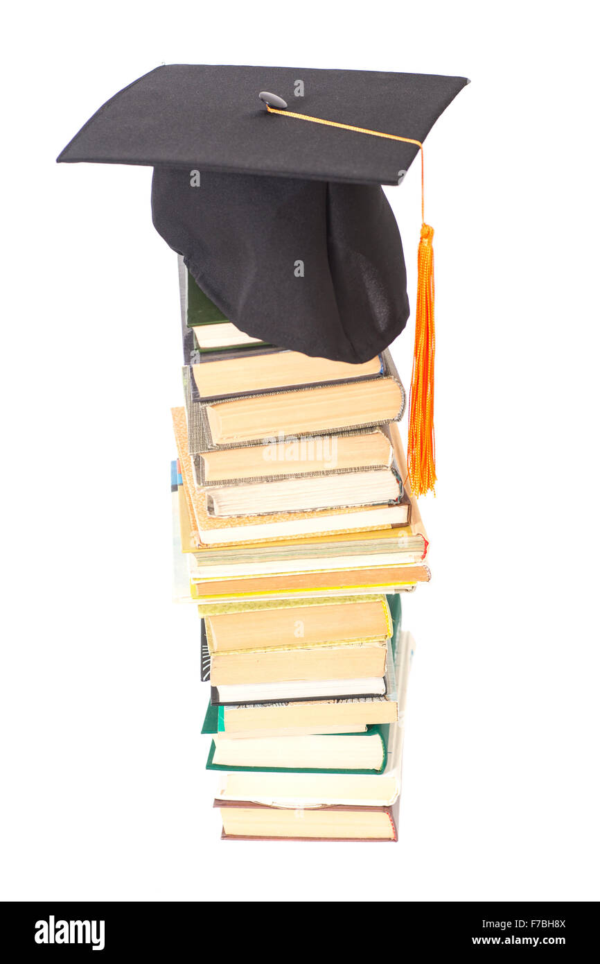 Graduation Hat with books isolated on white Stock Photo