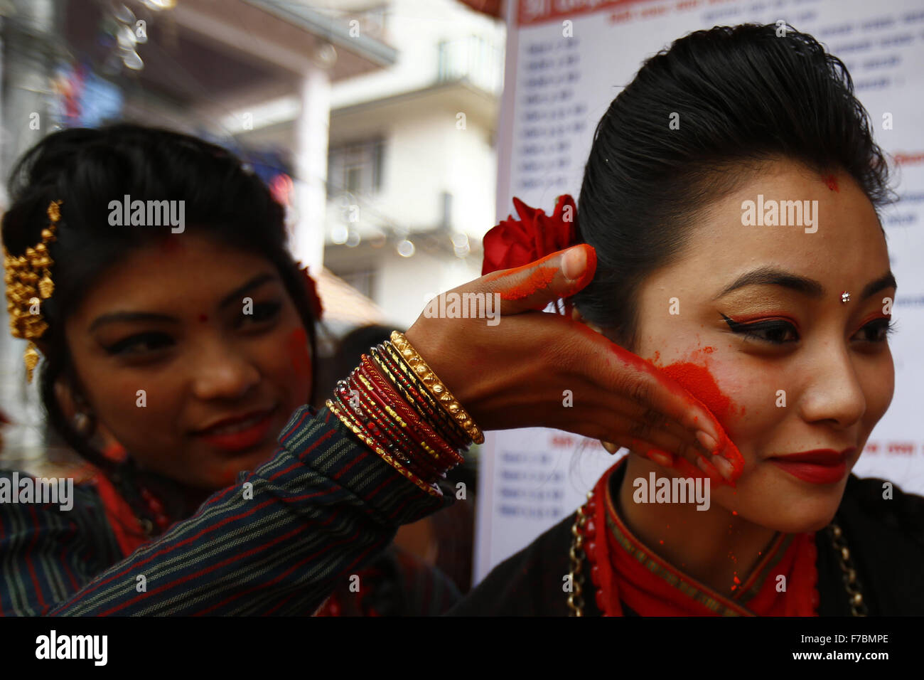 Kathmandu Nepal 28th Nov 2015 A Nepalese Woman Smears Vermillion Power On Her Friend S Face