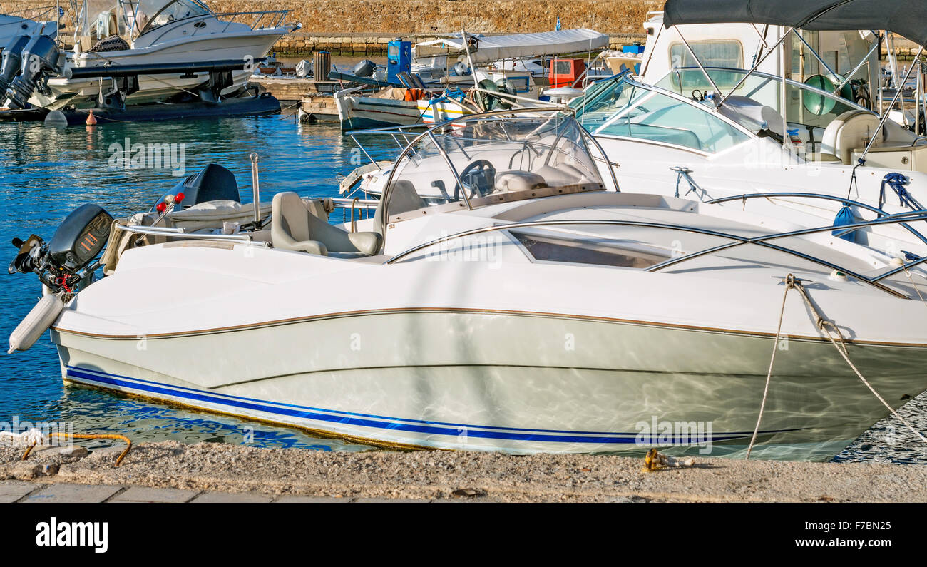 Several motor boats moored at the dock Stock Photo - Alamy