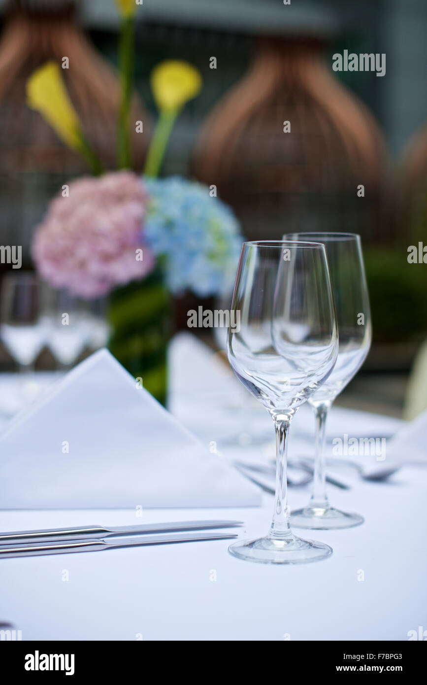 Wedding table set up with wine glasses Stock Photo - Alamy