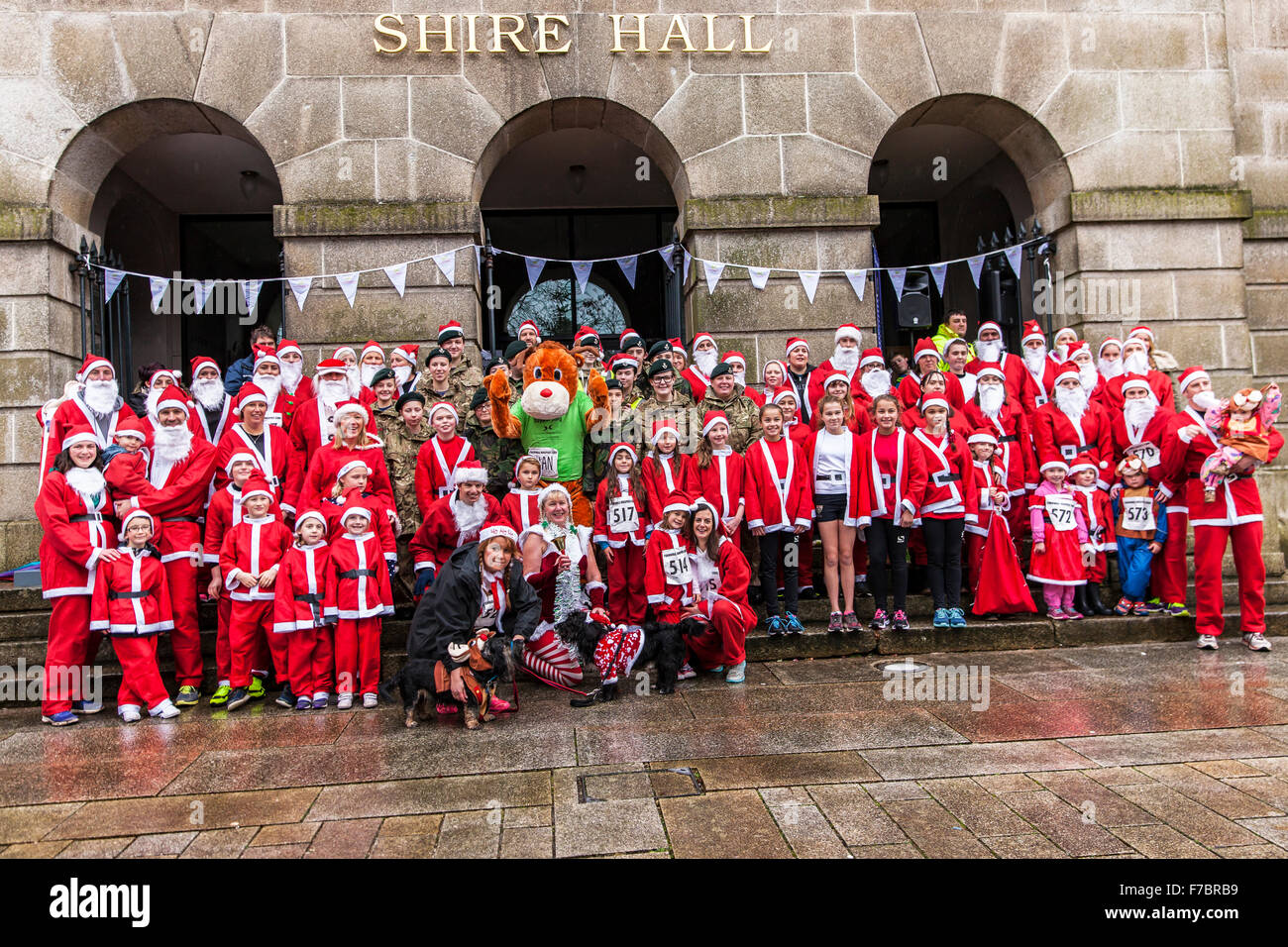 Bodmin Santa Fun Run. Bodmin, Cornwall, England. 28th November 2015. Bodmin Santa Fun Run organised by the Charity, Cornwall Hospice Care. Bodmin Cadets, Marshalls of the event and Runners, just before the event. Credit:  Barry Bateman / Alamy Live News Stock Photo