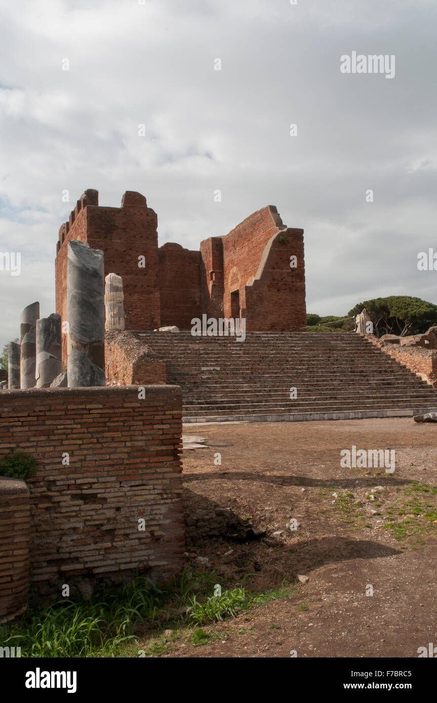 The huge excavations of the old harbor city of ancient Rome Ostia Antica shows well conserved buildings like the capitolium. Stock Photo