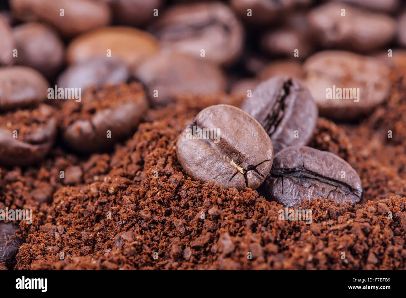 Macro coffee beans background Stock Photo - Alamy