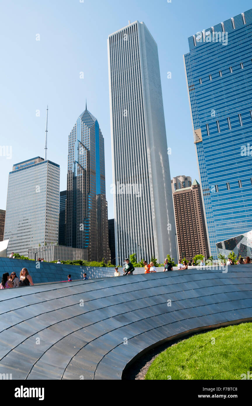 People crossing the BP Bridge in Chicago, designed by Frank Gehry. Stock Photo