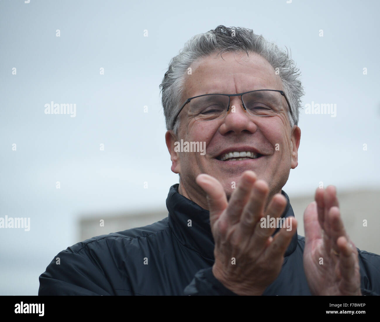 Irving, Texas, USA. 28th Nov, 2015. Reaction from a member of the peace rally outside an Irving moque after being taunted by a counter protester. Credit:  Brian Humek/Alamy Live News Stock Photo
