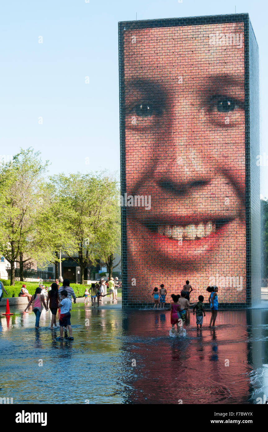 Children playing in the Crown Fountain in Millennium Park, Chicago. Stock Photo