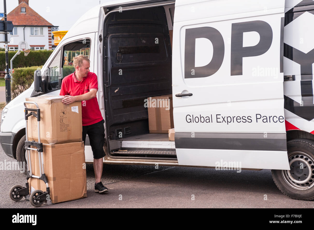 A DPD delivery driver delivering parcels in Southwold , Suffolk