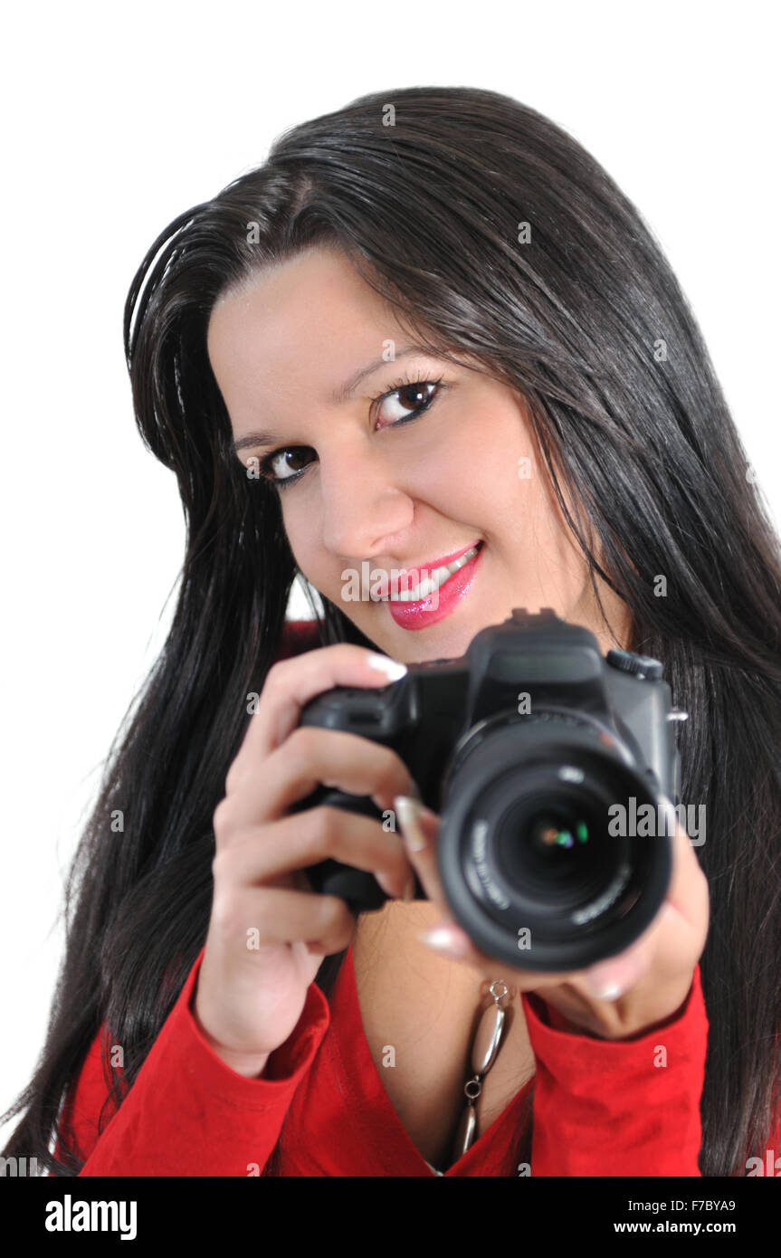 Young woman holding camera in hand taking picture isolated Stock Photo ...