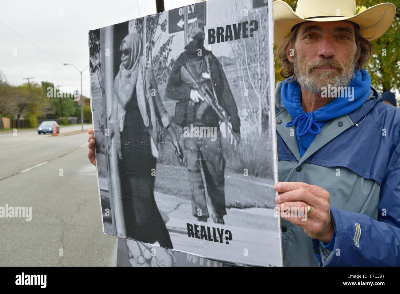 Irving, Texas, USA. 28th Nov, 2015. Man wearing cowboy hat rallies outside a mosque in Irving, TX  one week after armed men held a similar but lesser attended protest. Credit:  Brian Humek/Alamy Live News Stock Photo