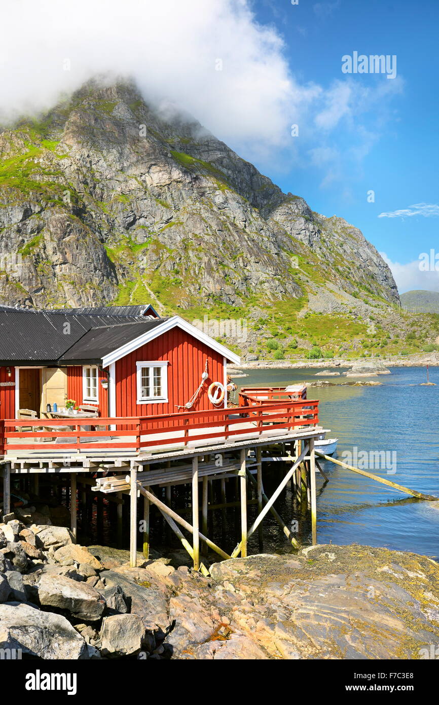 Traditional red wooden rorbu hut on Moskenesoya Island, Lofoten Islands, Norway Stock Photo