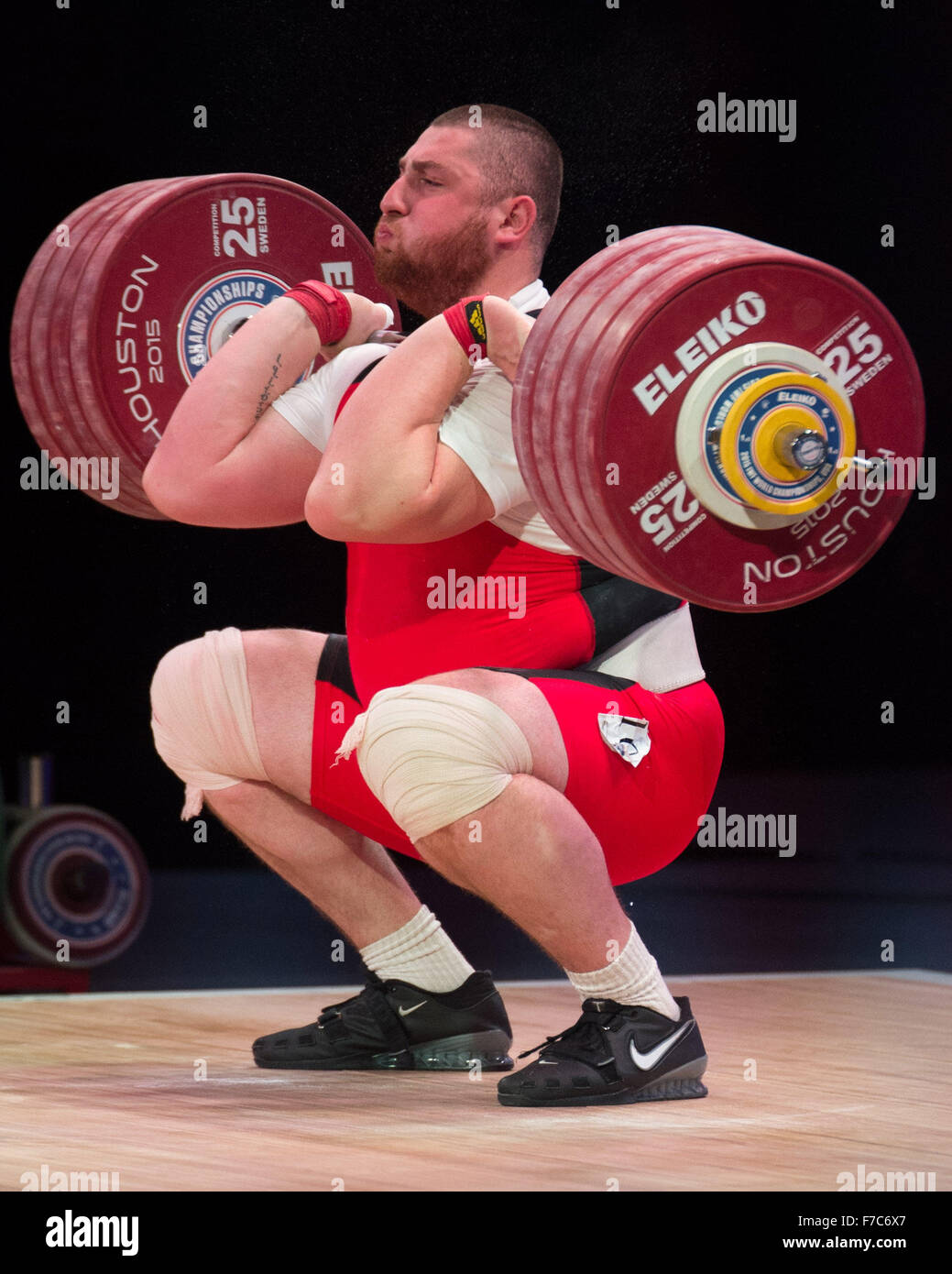 November 26, 2015: Lasha Talakhadze of Georgia wins the bronze medal in the  clean and jerk and a silver in the total in the Men's 105+ Class at the  World Weightlfting Championships