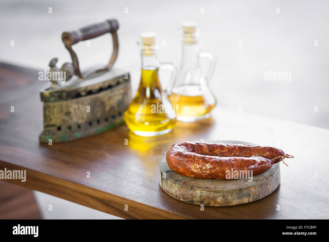 spanish traditional smoked pork chorizo sausage in rustic setting Stock Photo