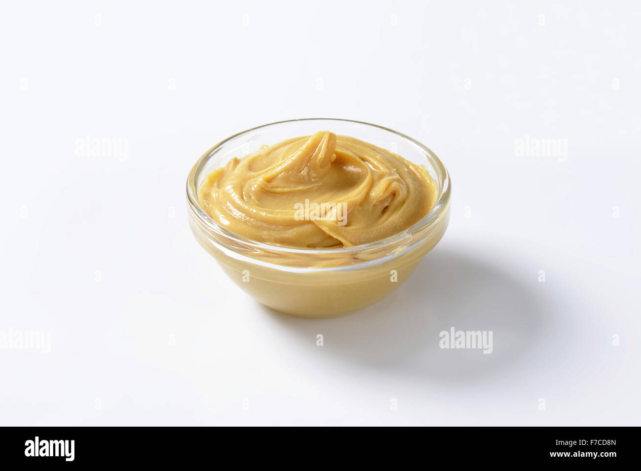 Bowl of smooth peanut butter Stock Photo