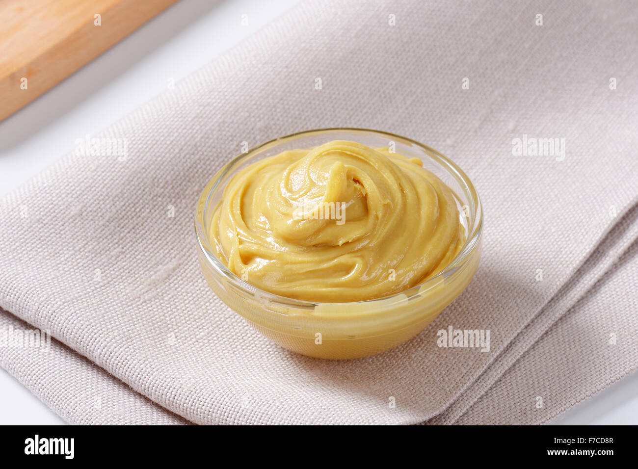 Bowl of smooth peanut butter Stock Photo