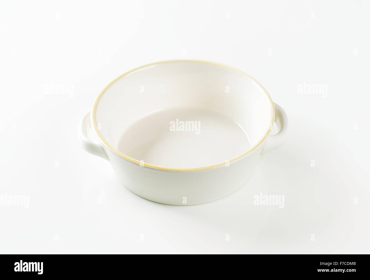 Round white ceramic dish with side handles Stock Photo Alamy