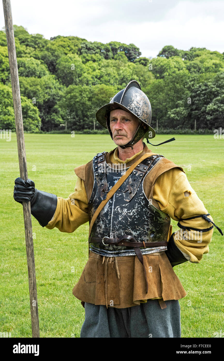 A member of the Sealed Knot society dressed as a pike man in the Parliamentarian army during an english civil war reanactment Stock Photo