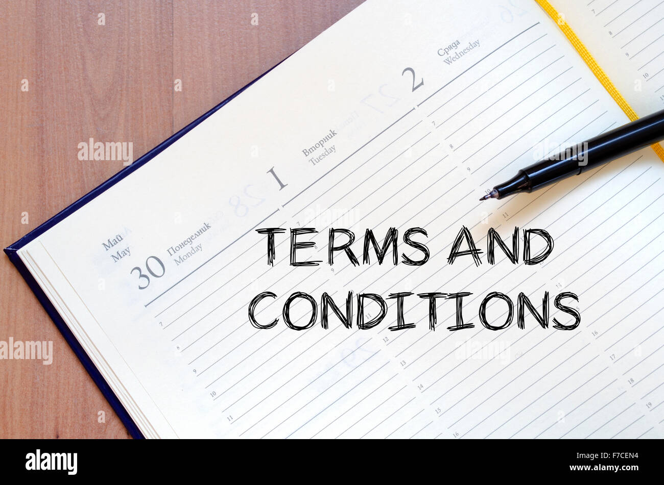 Terms and conditions text concept write on notebook with pen Stock Photo