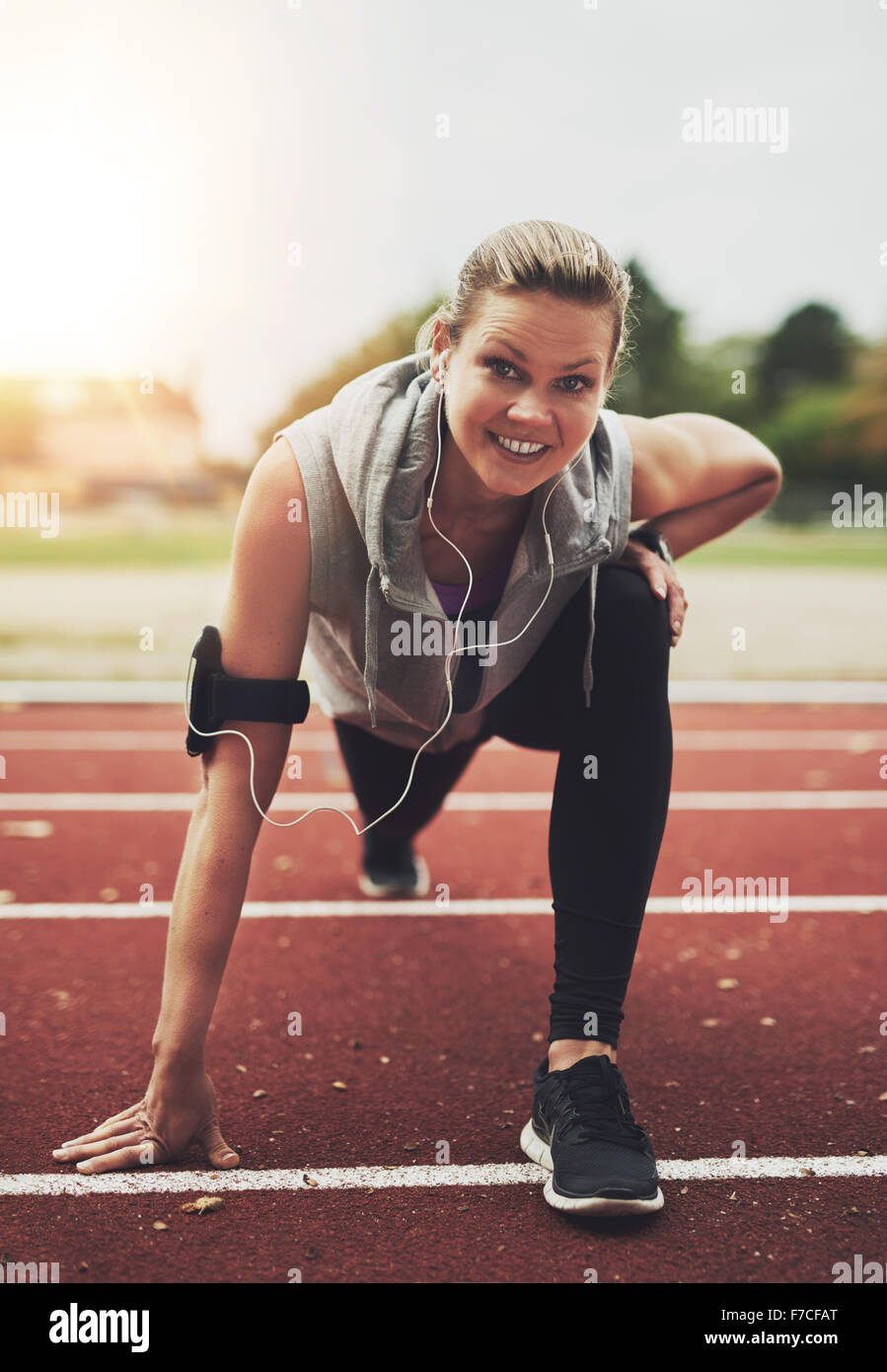 Fit blonde stretching on exercise hi-res stock photography and images ...