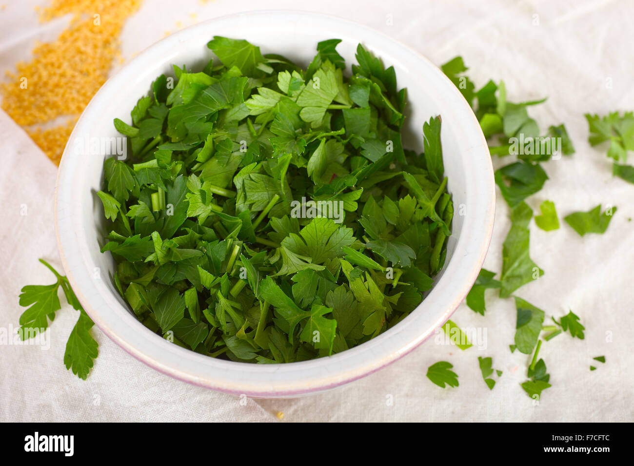 Chopped parsley in a bowl Stock Photo Alamy