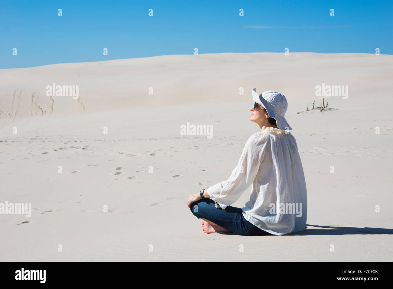 Female on sand dune hi-res stock photography and images - Alamy