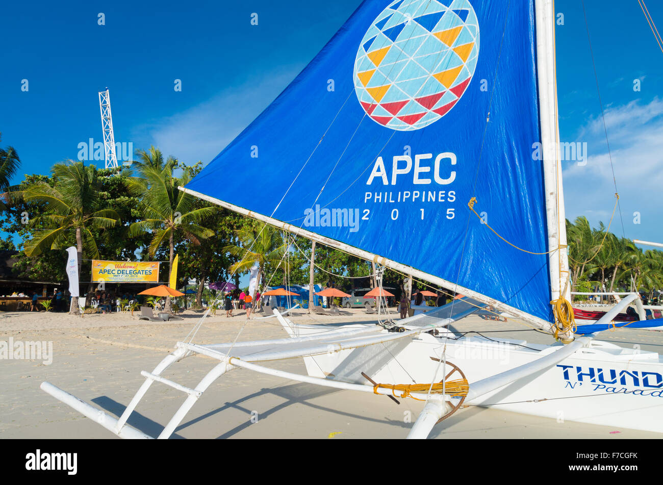 BORACAY, PHILIPPINES - MAY 20, 2015: Sailing boat with APEC sail. Asia-Pacific Economic Cooperation (APEC) is a forum for 21 Pac Stock Photo