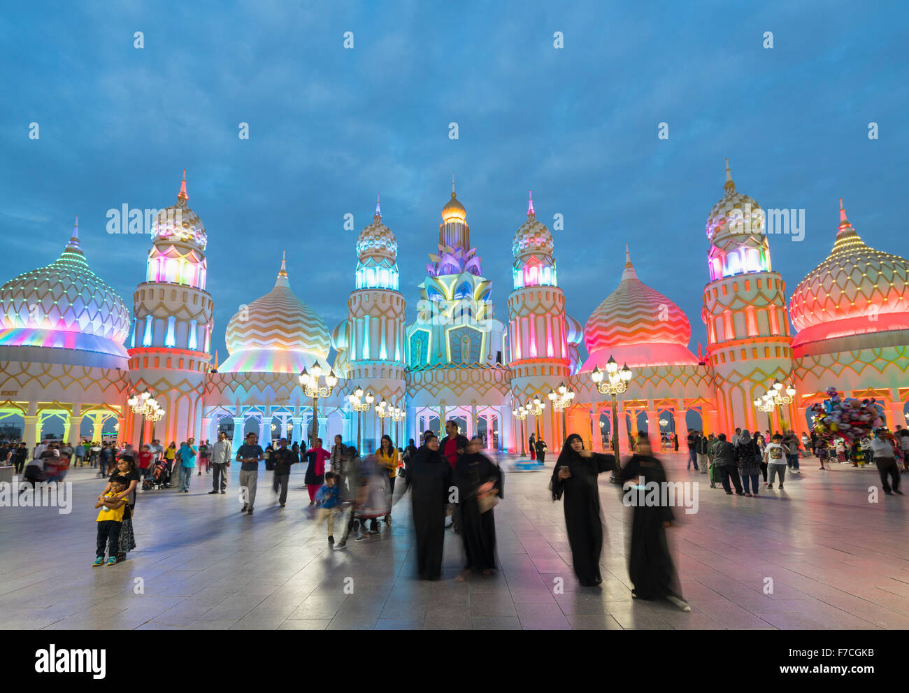 Evening view of illuminated Gate of the World at Global Village 2015 in Dubai United Arab Emirates Stock Photo