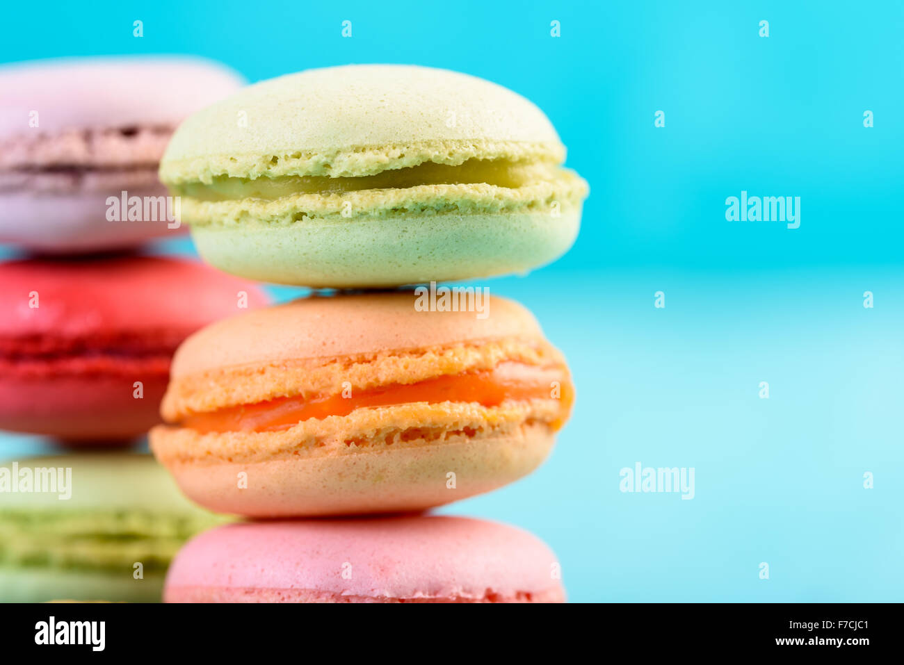 French Macaroons On Blue Background Stock Photo