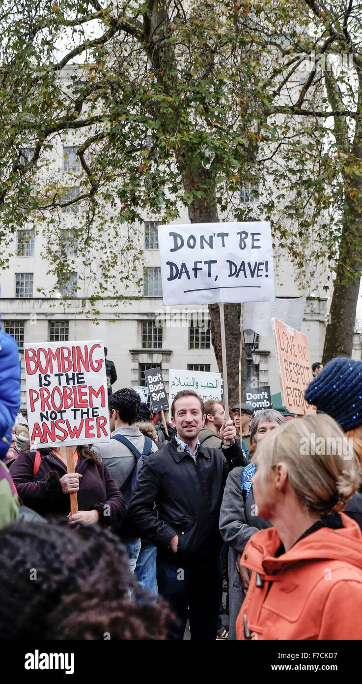 Protesters gather opposite Downing Street in London to protest at the UK government proposal to commence bombing Syria Stock Photo