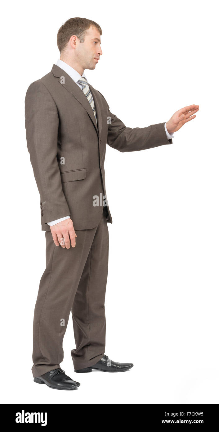 Businessman with outstretched hand, side view Stock Photo