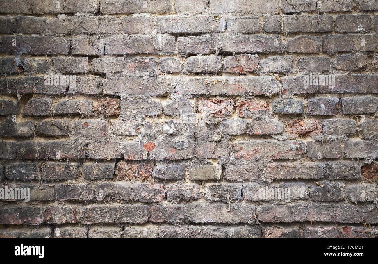 Old dark brick wall, closeup background photo texture Stock Photo - Alamy