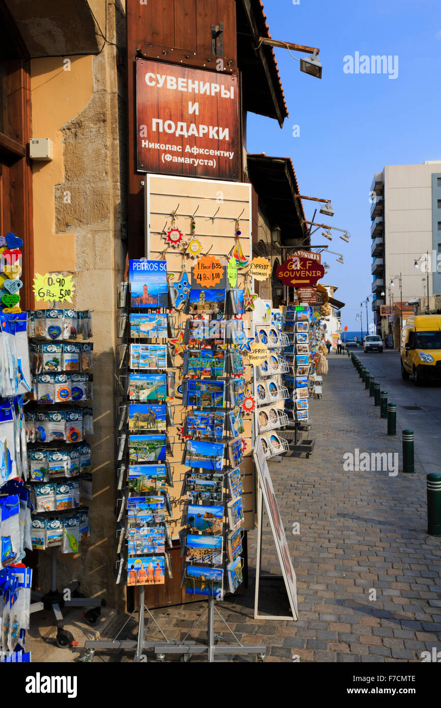Russian sign and Postcards on display outside a souvenir shop in Larnaca, Cyprus. Stock Photo