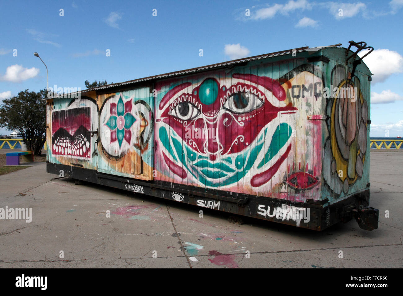 Old Train carriages in Puerto Madryn, Chubut, Argentina which have street art of Graffiti on them. Stock Photo