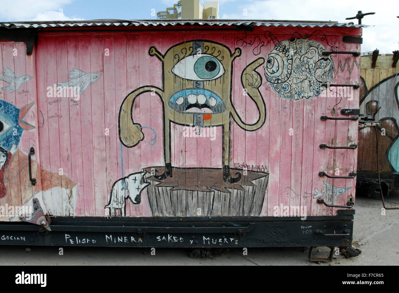 Old Train carriages in Puerto Madryn, Chubut, Argentina which have street art of Graffiti on them. Stock Photo