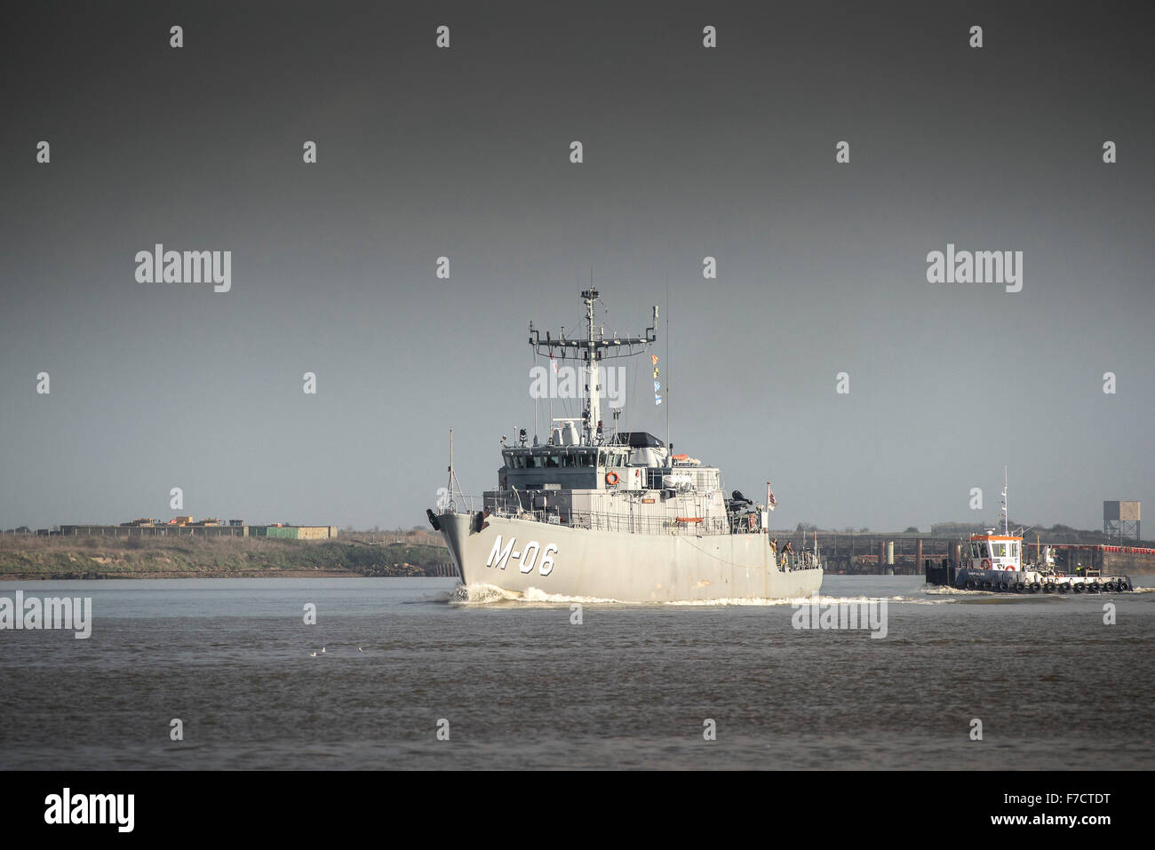 The NATO minehunter LVNS Talivaldis (M-06) steams upriver on the River Thames. Stock Photo