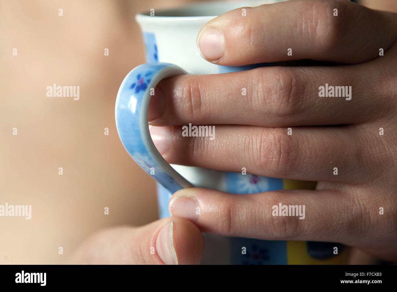 Cup of morning black coffee in female hands, coffee morning Stock Photo