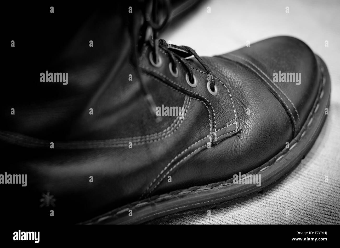 Close up of black leather Art Company biker style boot Stock Photo