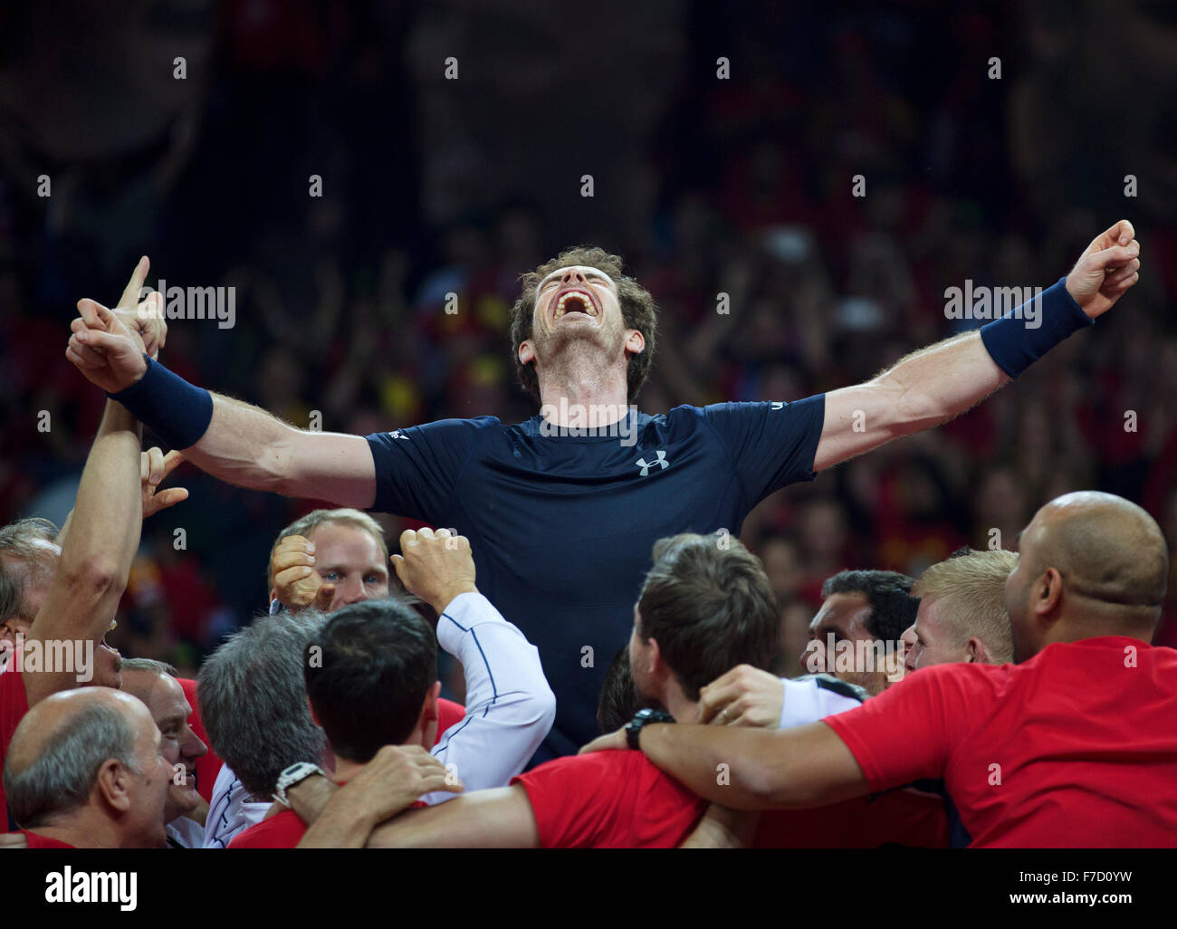 Gent, Belgium, November 29, 2015, Davis Cup Final, Belgium-Great Britain, day three, Andy Murray (GBR) screams it out in celebration while he is is lifted up by his team members, Great Britain wins the Davis Cup trophy 2015. Photo: Tennisimages/Henk Koster Stock Photo